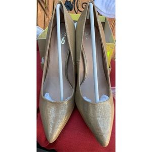 Nude and metallic gold pointed toe heels